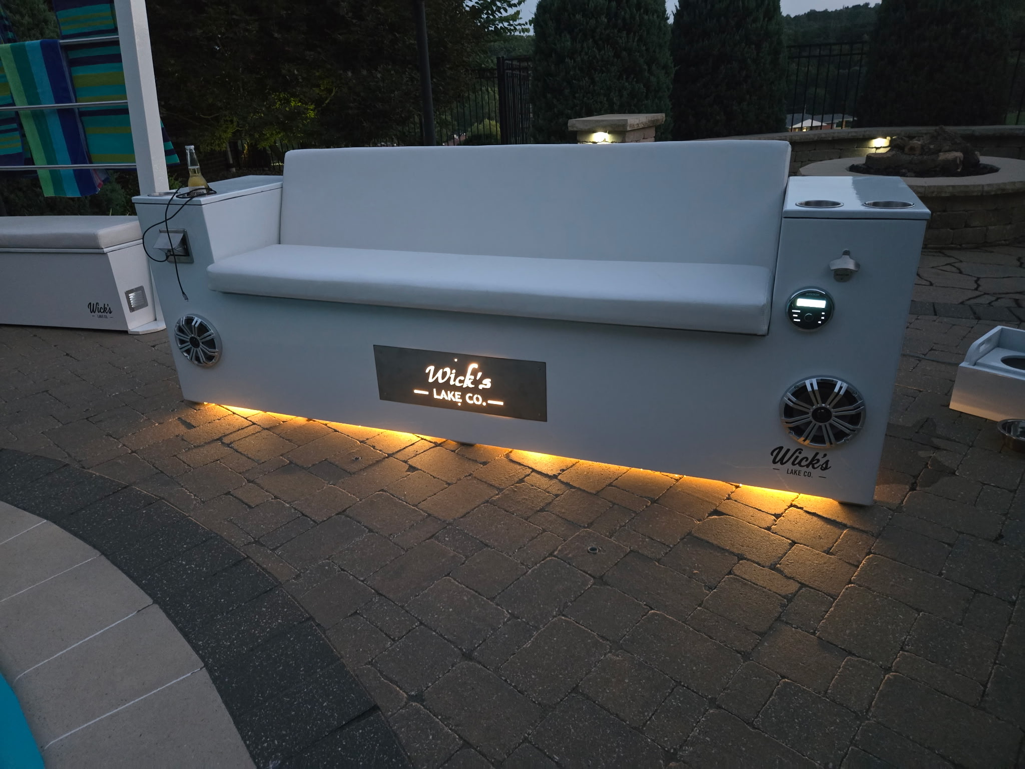 The Admiral at dusk with LED underglow, backlit plaque, and speakers